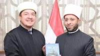 وزير الأوقاف يستقبل مفتي بولندا لتعزيز التعاون الديني والثقافي