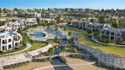 "WE" توقع اتفاقية تعاون مع "مكادي هايتس" لتنفيذ البنية التحتية بالمدينة