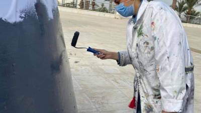 أعمال تزين ولمسات جمالية قبل افتتاح المتحف القومى للحضارة