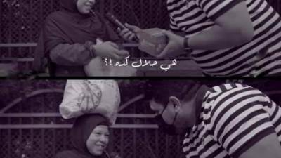 سيدة تخطف انظار رواد السوشيال ميديا بعد ظهورها مع مذيع الشارع  