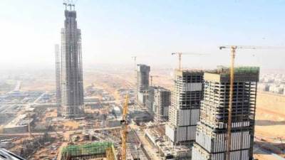 وزير الإسكان يشهد احتفالية الانتهاء من الأعمال الخرسانية بالبرج الأيقونى بالعاصمة الإدارية