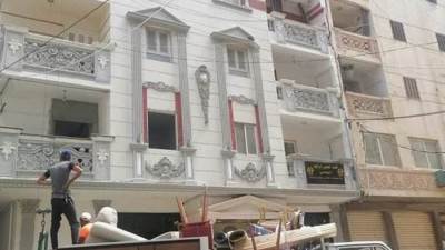 القاء القبض علي مالك عقار الأنفوشي واستلام مقاول الهدم العقار