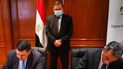 "توفيق" يشهد توقيع بروتوكول بين"القابضة للنقل" و"إي فاينانس" للربط والتحصيل الإلكتروني