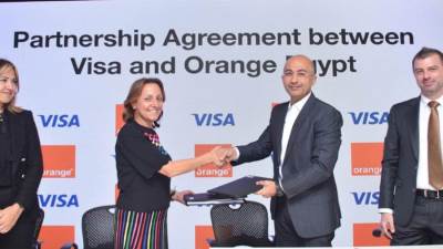 "اورنچ مصر" توقع اتفاقاً حصرياً مع "فيزا العالمية" لعملاء "اورنچ  كاش"