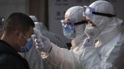 الصين تشدد القيود لاحتواء معاودة ارتفاع إصابات كورونا