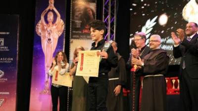 في ختام المهرجان الكاثوليكي.. كرم الفنان الصغير الموهوب "عمر شريف" 