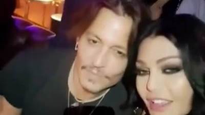 جوني ديب يحتفل مع النجمه اللبنانية "هيفاء وهبي" بكسبه معاركته القضائية