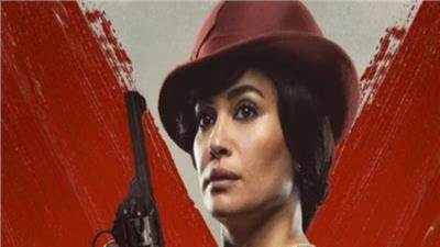 بمسدس وبدلة حمراء.. هند صبري تروج لفيلمها كيرة والجن 