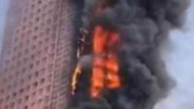 احتراق ناطحة سحاب من 200 طابق في الصين 