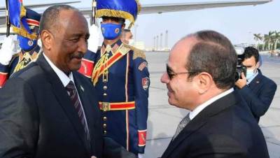 الرئيس السيسي يودع رئيس مجلس السيادة الانتقالى السودانى 