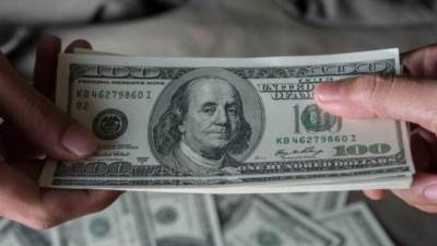 استقرار الدولار بالتزامن مع تشديد قيود كوفيد في الصين 