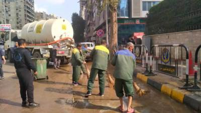 عودة حركة المرور لطبيعتها بشارع التحرير بعد الدفع بسيارات شفط مياه