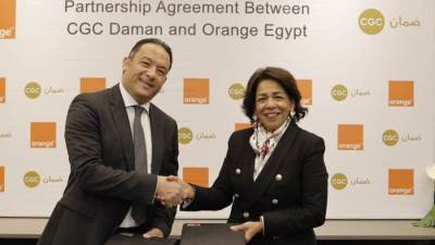 بروتوكول تعاون بين شركتي "ضمان" و" أورانچ مصر"