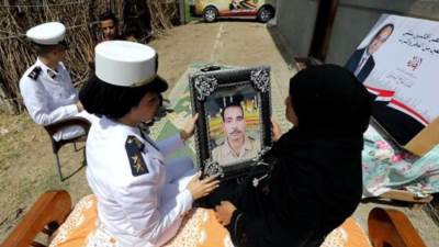 رسالة شكر من أسر شهداء الشرطة للرئيس السيسي