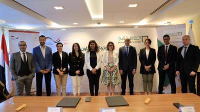 توقيع بروتوكول تعاون بين البنك الأهلي المصري والوكالة الألمانية