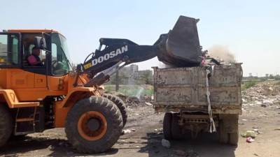 أعمال نظافة ورفع للمخلفات والإشغالات وتعديات المحال والباعة ببولاق والطالبية