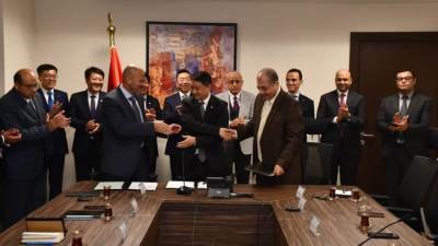 الإسكان وشركة صينية توقعان مذكرة تعاون لإدارة منطقة الأعمال المركزية بالعاصمة الإدارية