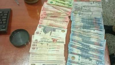 جمارك مطار برج العرب تضبط محاولة تهريب كمية من النقد المصري والأجنبي