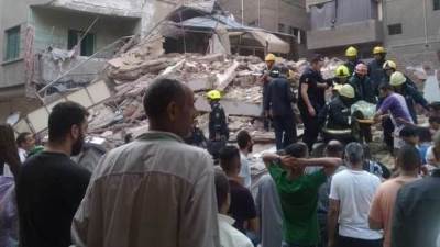 بالصور.. رجال الحماية المدنية يواصلون البحث أسفل عقار حدائق القبة المنهار