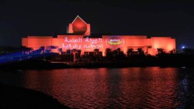 المتحف القومى للحضارة المصرية يضئ واجهته باللون البرتقالي