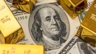 انخفاض البورصة الأمريكية والنفط وارتفاع سعر الذهب عقب قرار تثبيت الفائدة