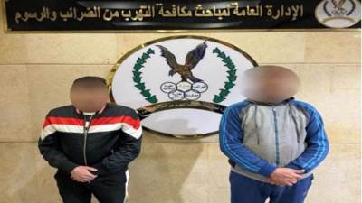 ضبط صاحب شركة وآخر بالجيزة لإتجارهما بملابس "البالة" خارج المنطقة الحرة