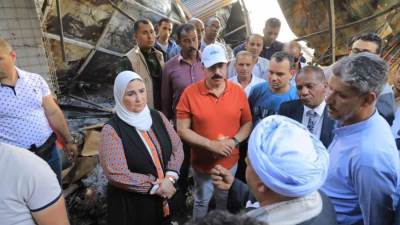 وزيرة التضامن توجه بتقديم المساعدات للعاملين المتضررين في مول "فيلة" بوسط أسوان