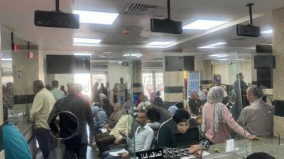 رئيس جهاز العبور يتابع سير العمل بمركز خدمة تقنين أوضاع المناطق المضافة