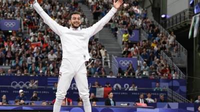 وزير الرياضة يهنئ البطل محمد السيد بالميدالية الأوليمبية البرونزية