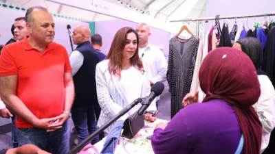 وزيرة التنمية المحلية تتفقد التشغيل التجريبي لمعرض المشروع القومي لتنمية الأسرة