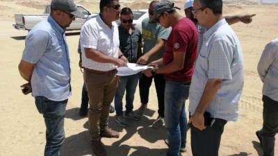 تطوير الطرق بمنطقة الصناعات المتوسطة وترفيق الأراضي السكنية ببني سويف الجديدة