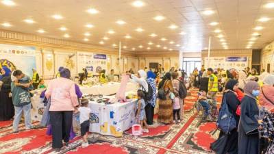 دكان الفرحة يوفر 14 ألف قطعة ملابس للأطفال الأيتام وذوي الهمم 