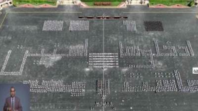 طلاب أكاديمية الشرطة يرسمون بأجسادهم "ادخلوها آمنين.. عاشت مصر"