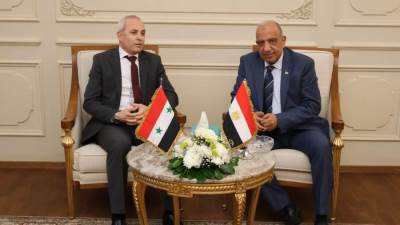 محمود عصمت يلتقي والدكتور سنجار طعمة وزير الكهرباء السوري