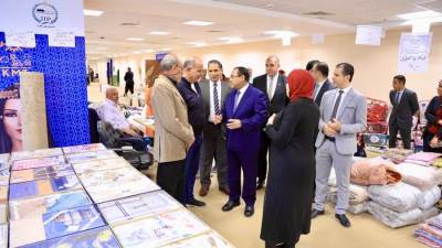 التنظيم والإدارة ينظم معرضاّ لملابس الشتاء والأجهزة الكهربائية ومعروضات الأسر المنتجة بمقره بالعاصمة الإدارية ويدعو موظفي الحي الحكومي لزيارته والاستفادة من التخفيضات