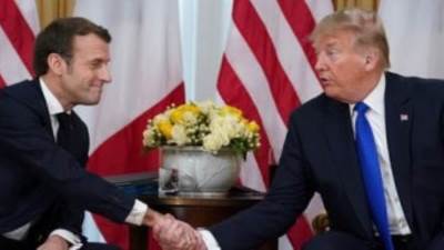 ترامب خلال زيارته لفرنسا: العالم أصبح مجنونا بعض الشيء الآن