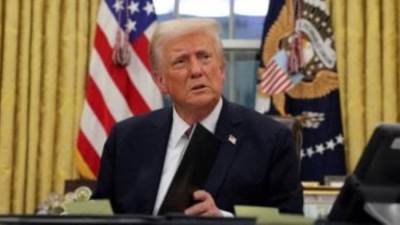 ترامب: بوتين لن يسيطر على أوكرانيا فى وجودى