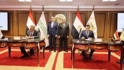 وزير العدل يشهد مراسم توقيع بروتوكول تعاون بين وزارة العدل والبنك الأهلي المصـري