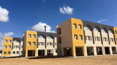 تسليم: تسليم مدرسة للتعليم الأساسي وترخيص مباني جامعة وتنفيذ مشروعات مرافق وكهرباء وطرق 