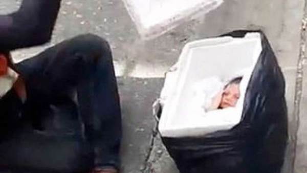 العثور على جثة رضيع بأحد صناديق القمامة