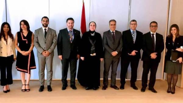 نيفين جامع أثناء اجتماعات منظمة التجارة العالمية